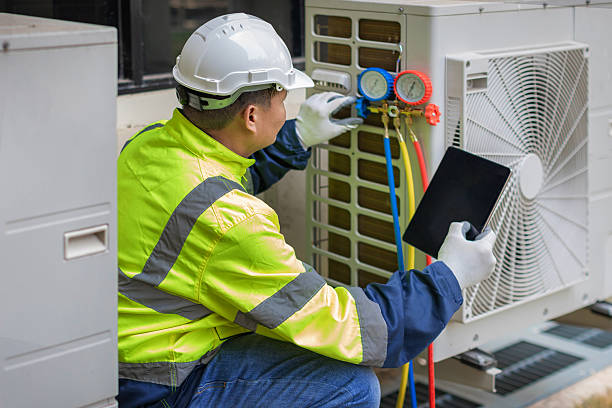 Professional Hvac technician working in Lenoir, NC